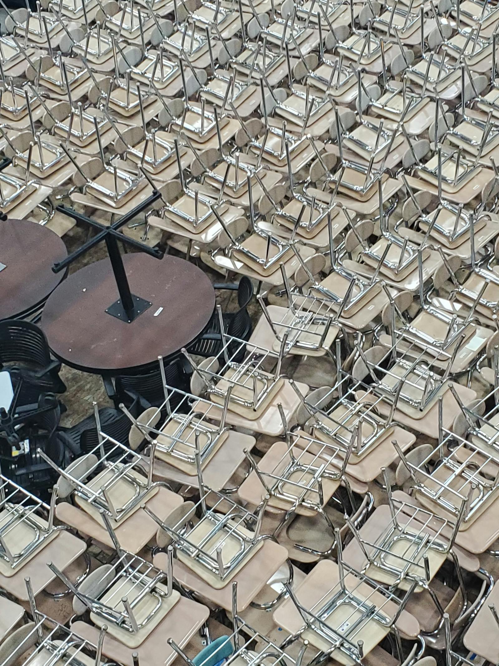 Stacked chairs and tables available for resale